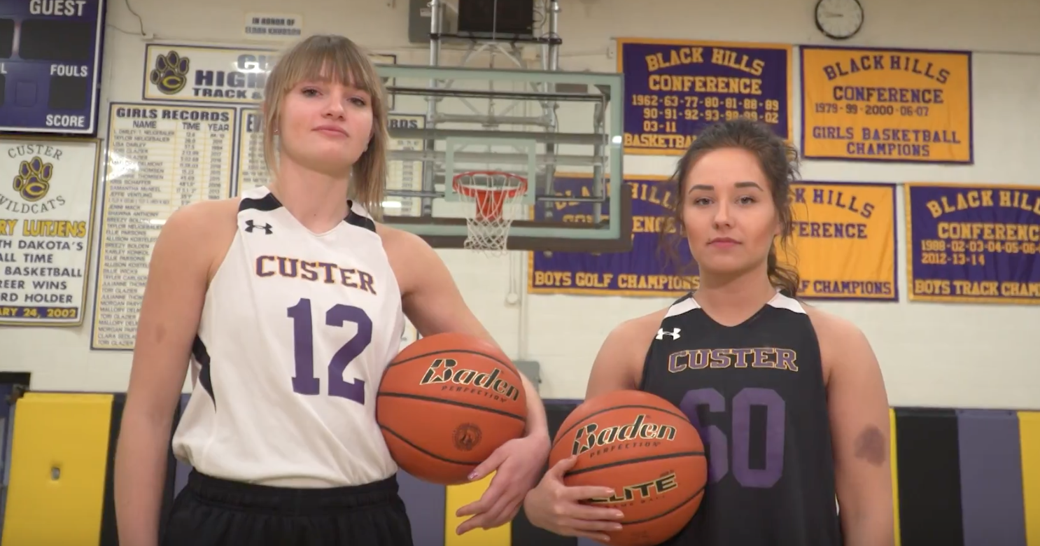 Custer girls basketball players Tori Glazier and McKenzie Becker
