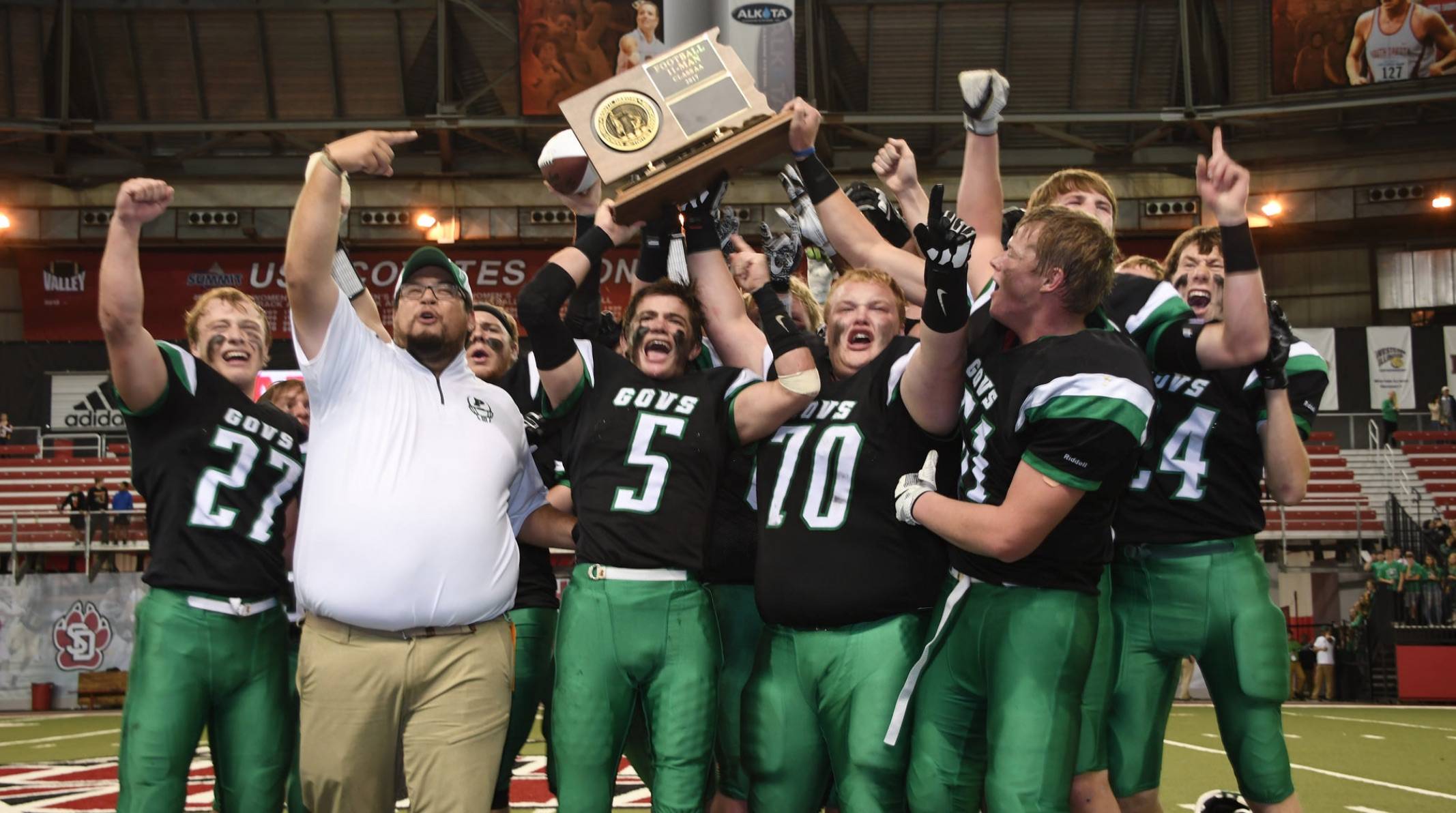 Pierre Govs football team holding state title