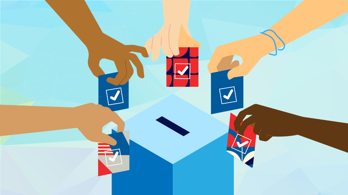 Image of hands at the ballot box