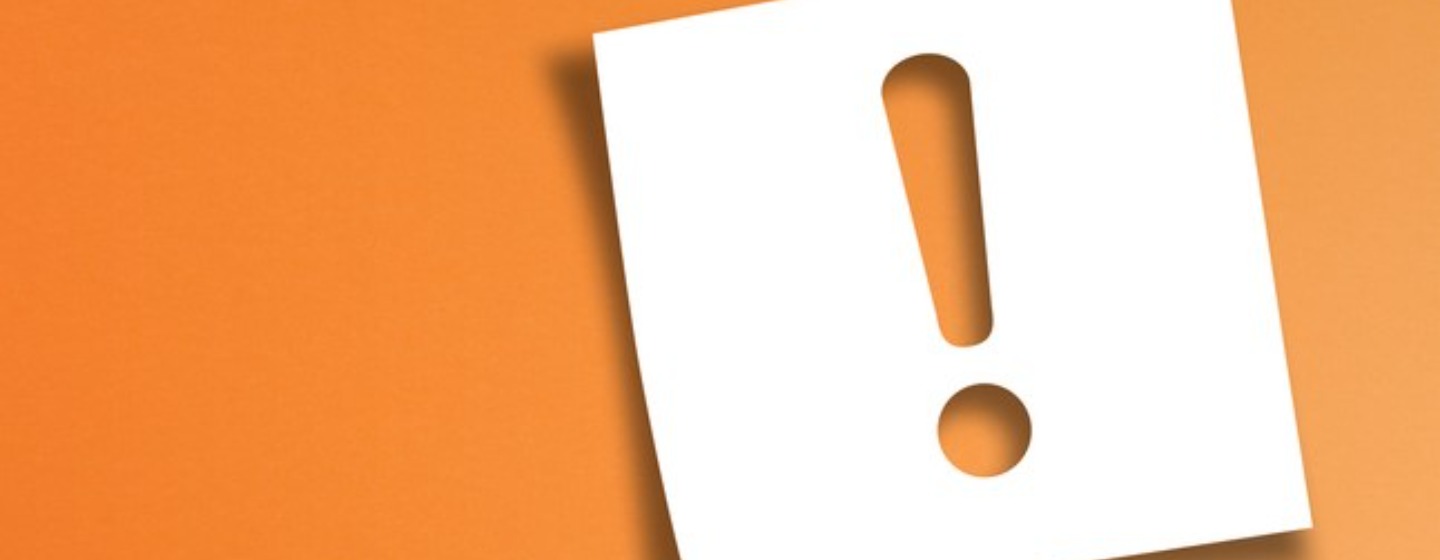 Exclamation mark icon on orange background